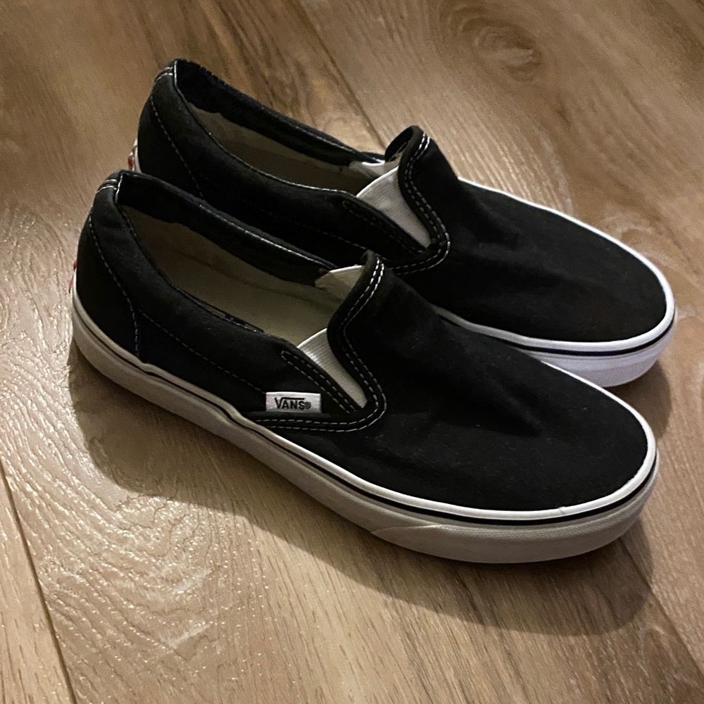 Vans Black and White Slip-On Sneakers